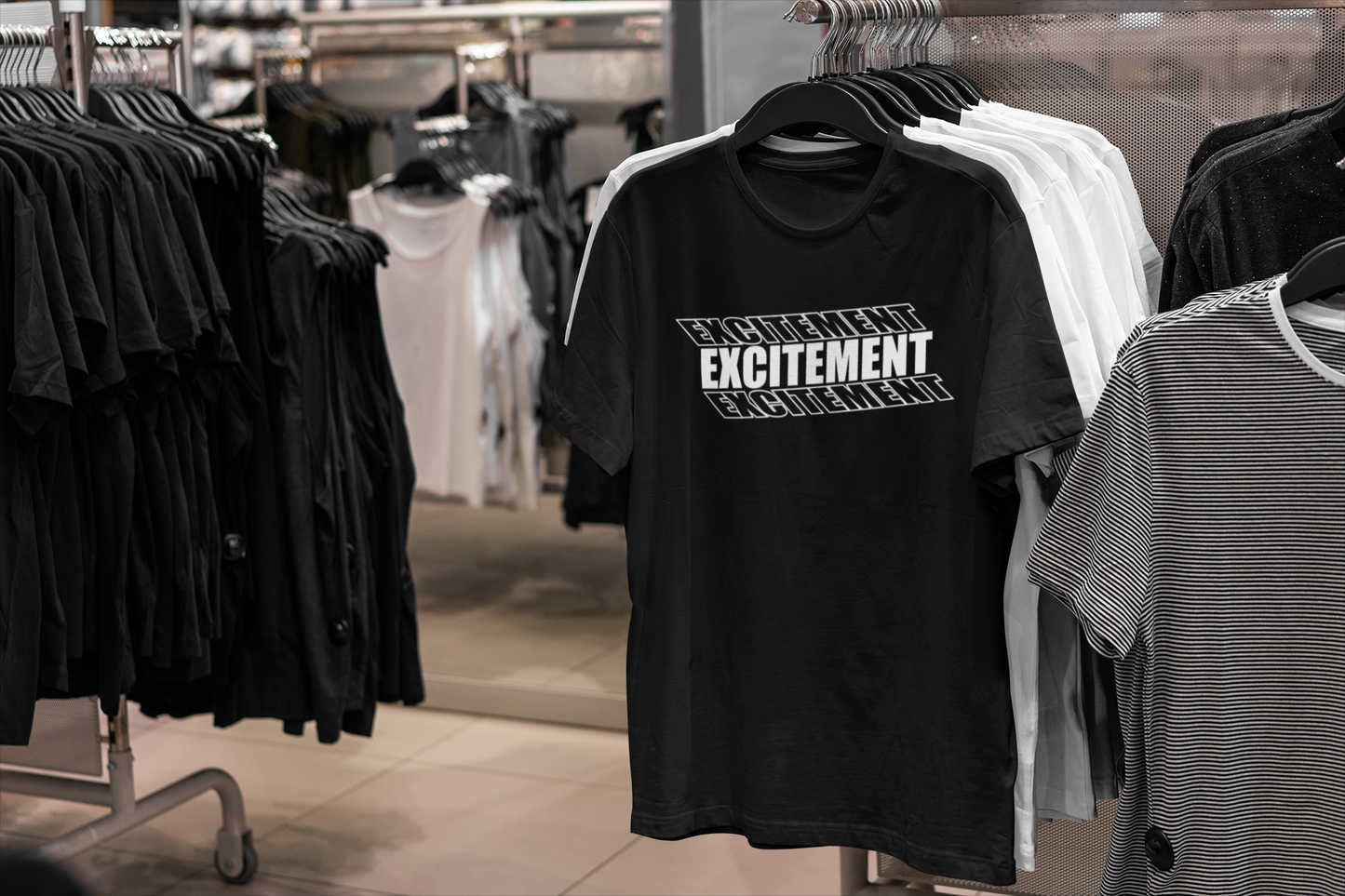 black t-shirt hanging in store
